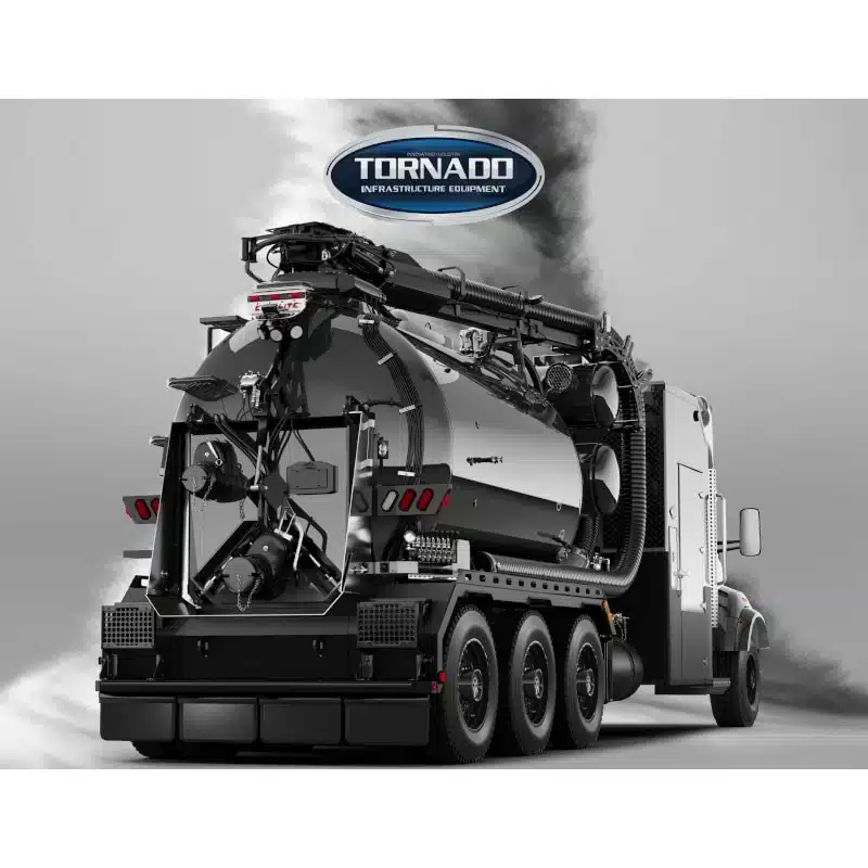 A large Tornado Land Vehicles vacuum truck with multiple hoses and equipment is parked, viewed from the rear and side, featuring the company logo above.